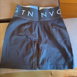 TWO pairs small High-Waisted NVGTN spandex shorts. Dark grey and dark green.
